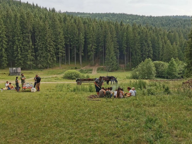 Family horse-drawn carriage rides on the plains of Harghita