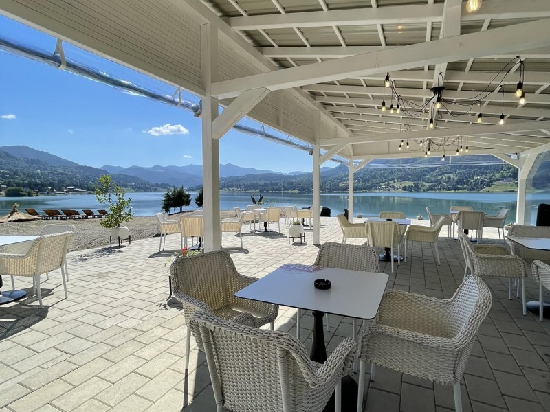Luxury penthouse and buoyancy boat ride on Lake Colibita
