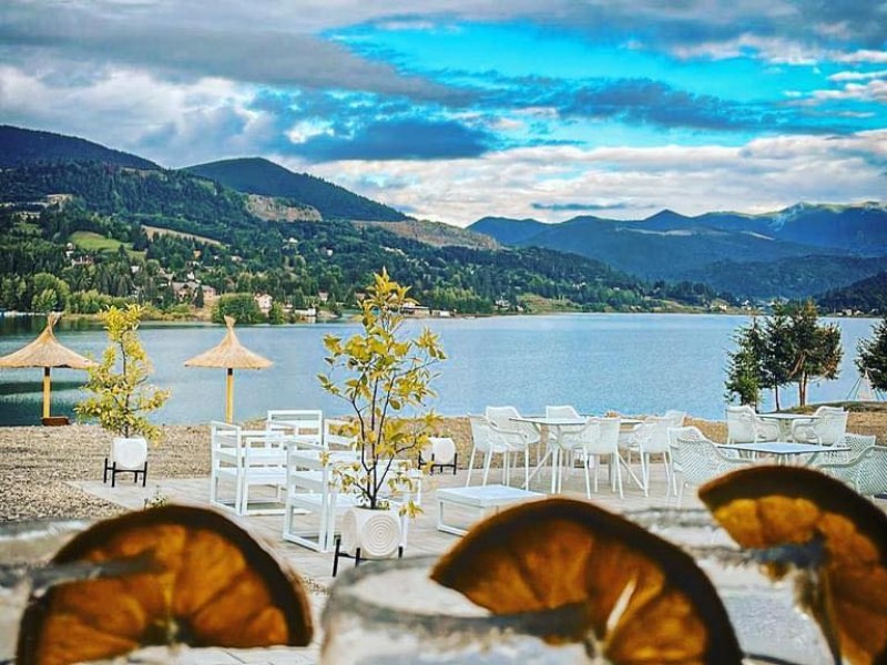 Luxury penthouse and buoyancy boat ride on Lake Colibita