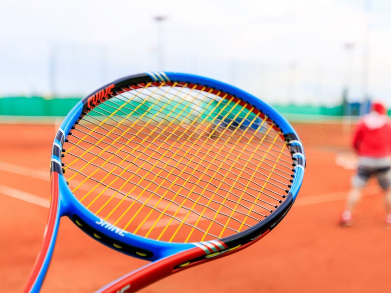 Play tennis on a modern court in Timisoara