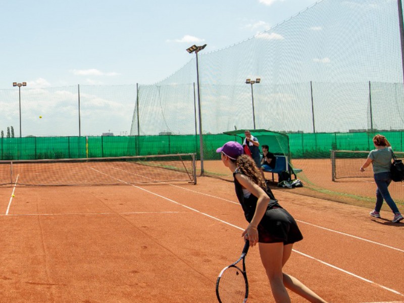Play tennis on a modern court in Timisoara