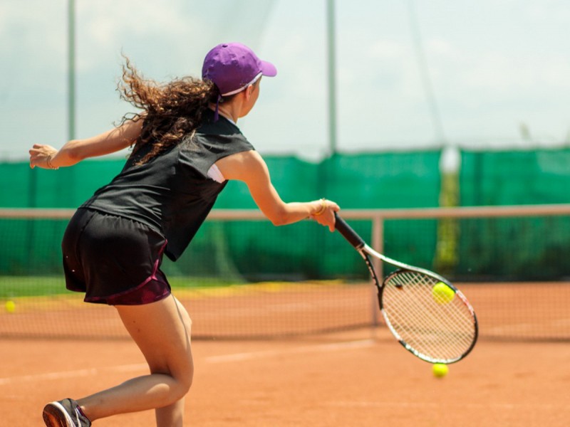 Play tennis on a modern court in Timis