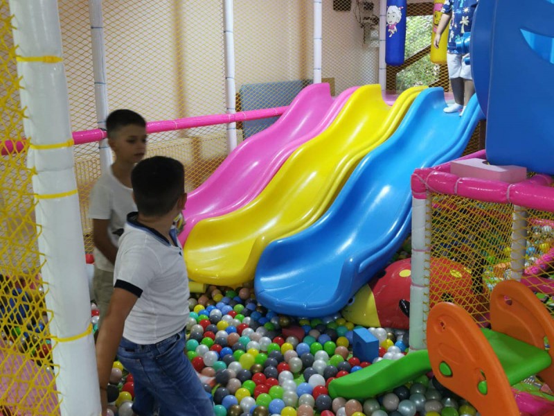 Party at a children's playground with heated pool