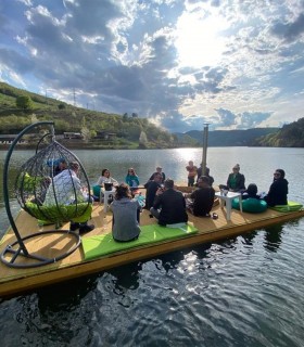 Relaxing with friends in the ciubar on the pontoon of a lake near Cluj