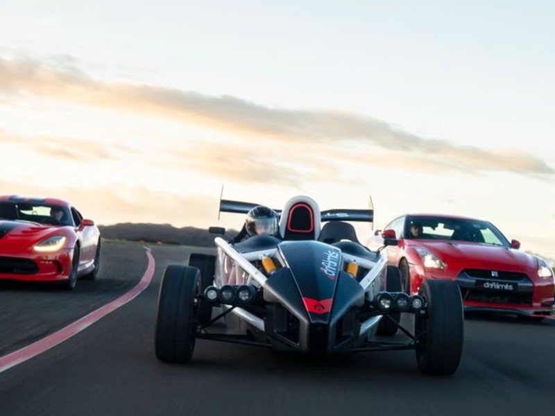 Speeding around the track in two super cars in Hertfordshire