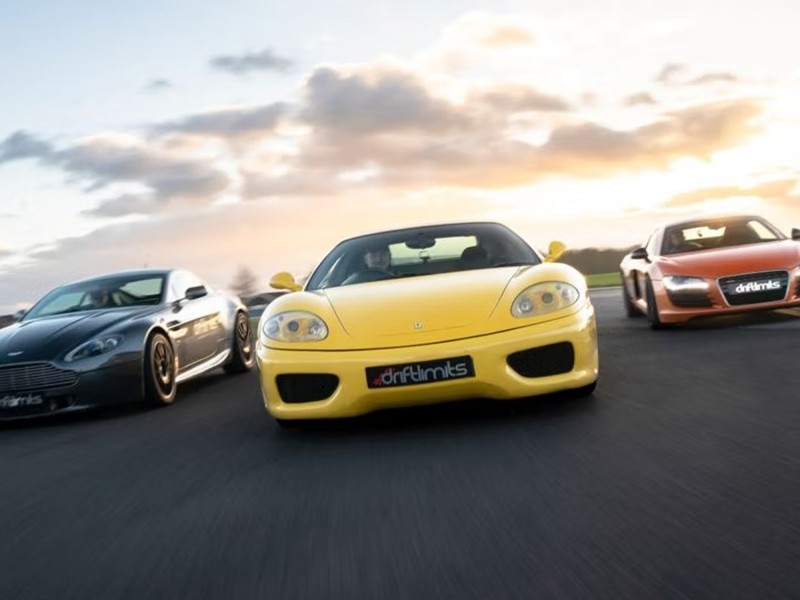 Speeding around the track in two super cars in Hertfordshire