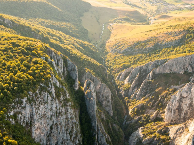 Flying with an ultra light airplane over the Retezat and Parang Mountains, in Cluj-Napoca