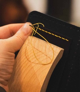 Natural leather wallets sewing workshop in Bucharest